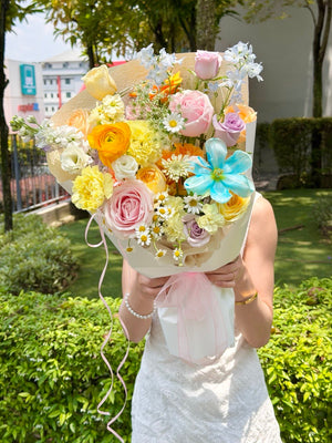 Elegant mixed colour bouquet with blue tulip, buttercup roses and ranunculus, suitable for birthday surprise and anniversary celebration in Kuala Lumpur.