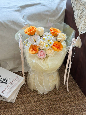 Round shape soap flower bouquet with orange and white roses, perfect for birthday and anniversary gift, elegant wrapped design.
