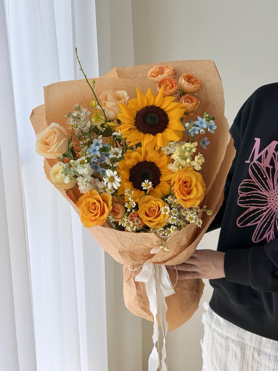 Beautiful sunflower and orange rose graduation bouquet handcrafted for university graduates in Sunway, Bukit Jalil, and nearby areas.