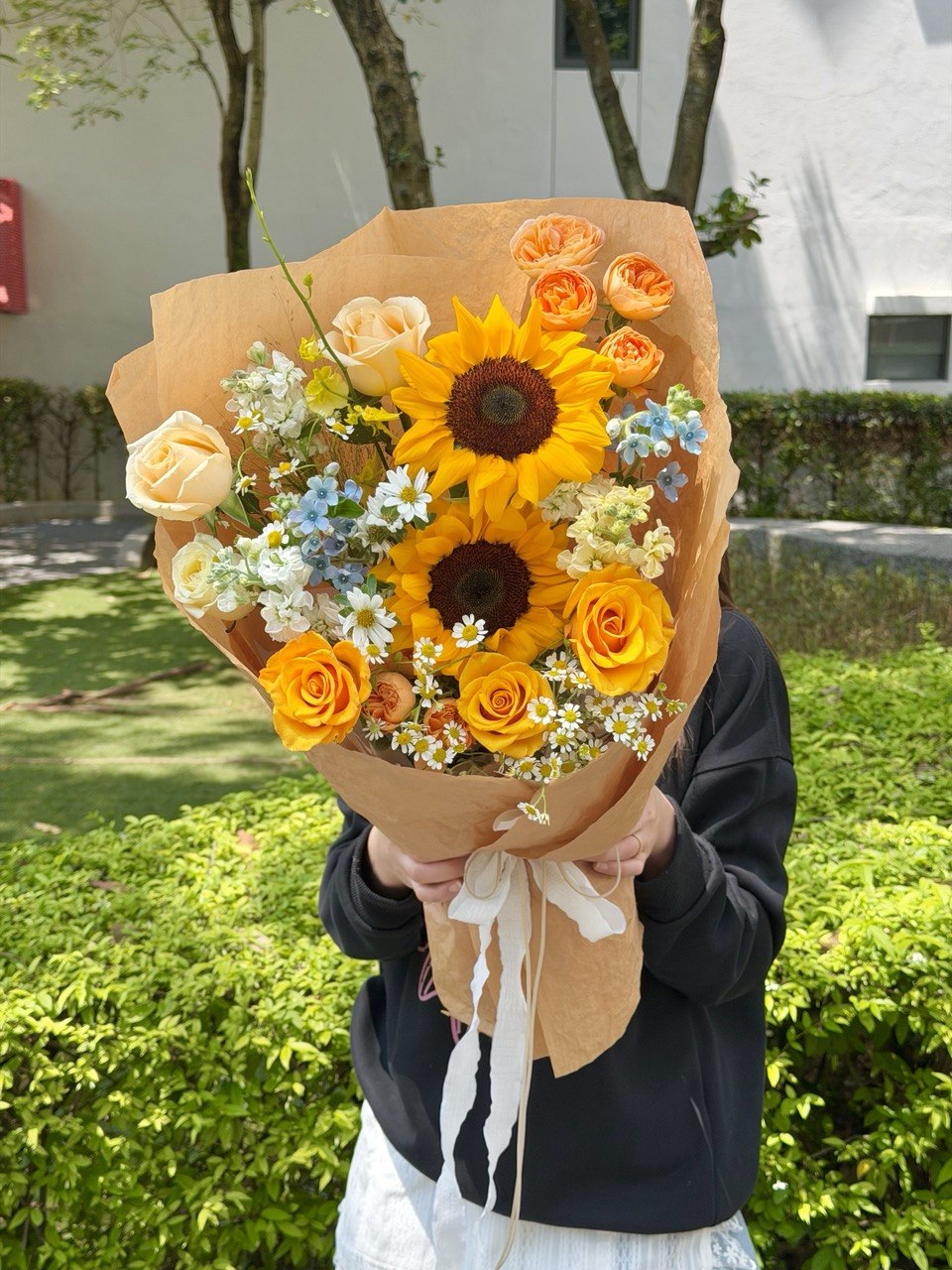 University graduation flower bouquet with sunflower and orange rose theme, perfect for convocation celebrations in Sunway and Bukit Jalil.