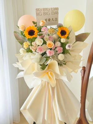 Luxury cream opening flower stand with balloons and mixed flowers for shop opening gift Kuala Lumpur.