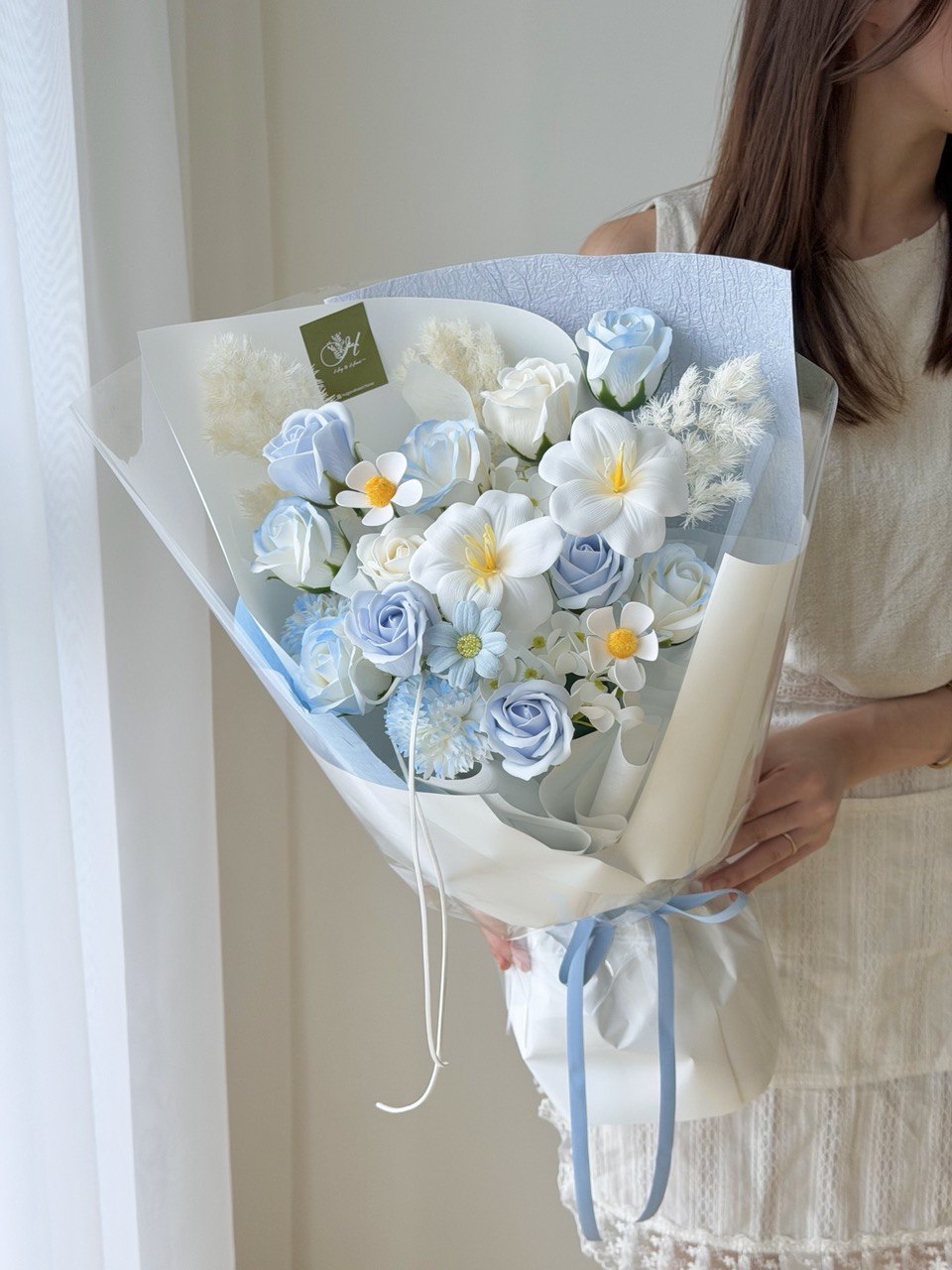 Premium soap flower arrangement with blue roses and white tulips, soft pastel bouquet for same day delivery Kuala Lumpur.