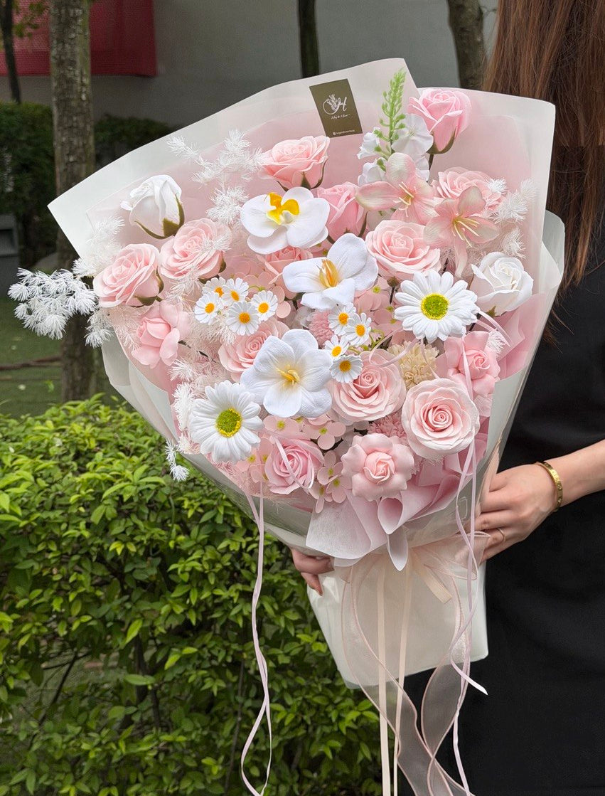 A large bouquet of soap flower featuring soap pink rose and kiss of fairy rose spray, the perfect anniversary flower gift at KL.