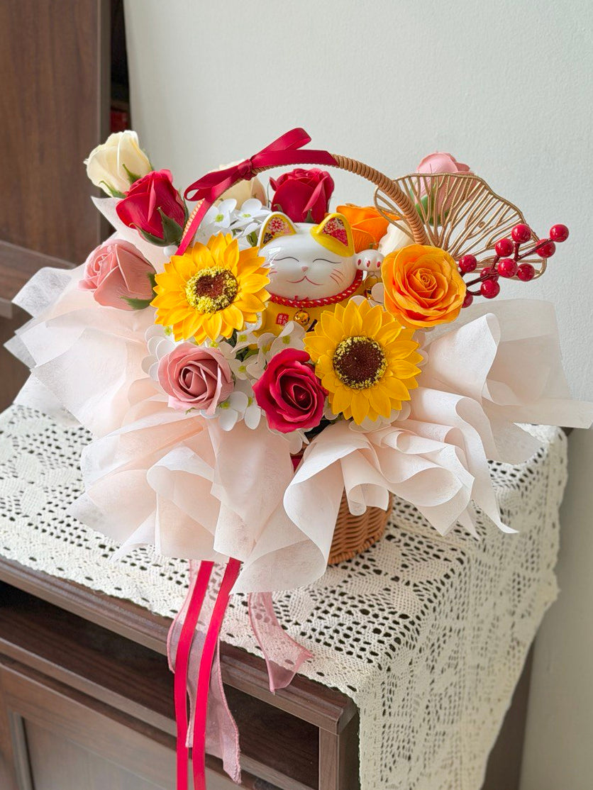 A business opening lucky cat in a basket with soap flower perfect for grand business opening gift.
