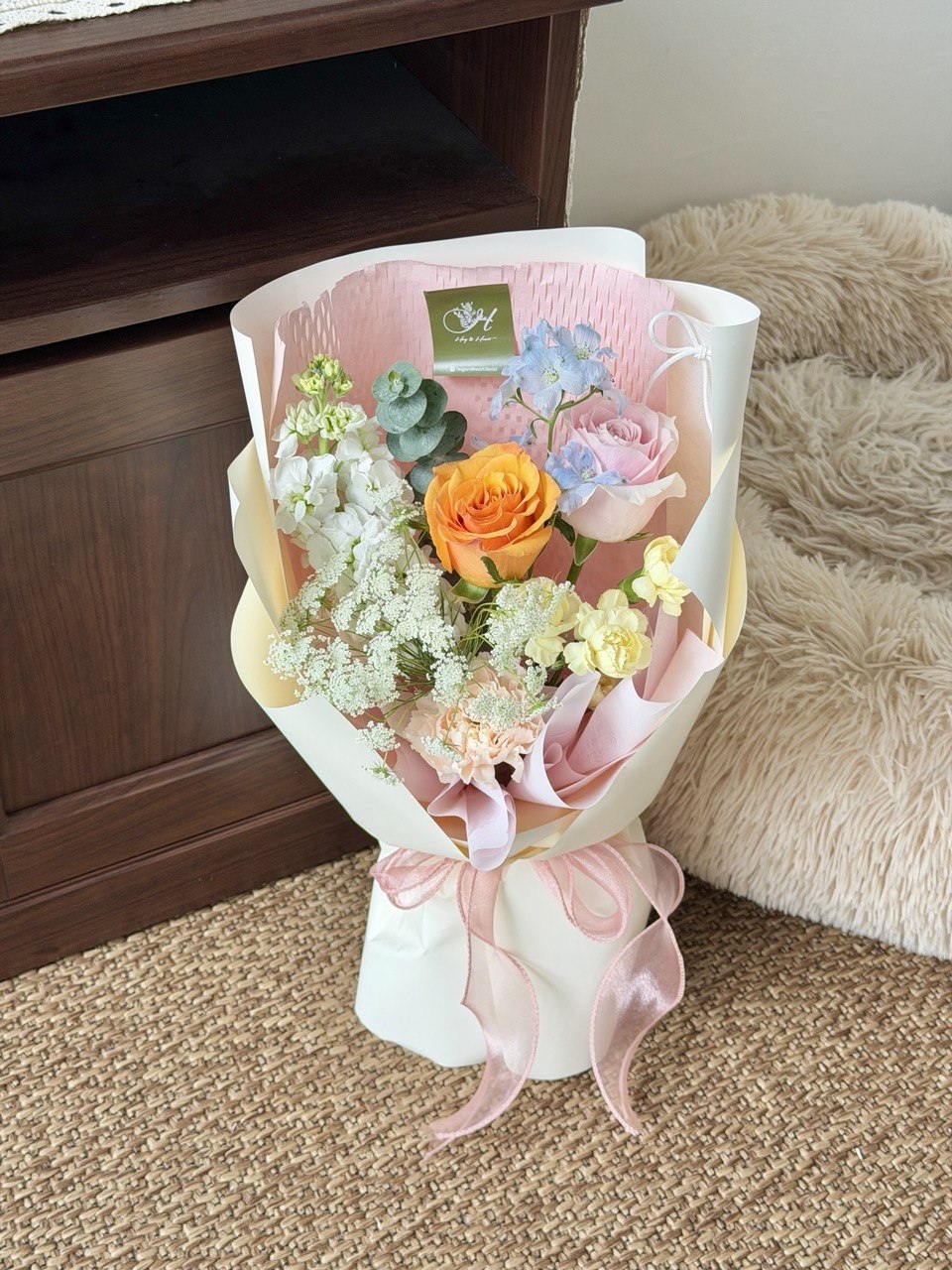 Small handcrafted flower bouquet packed with love, ideal anniversary flowers delivery Kuala Lumpur.