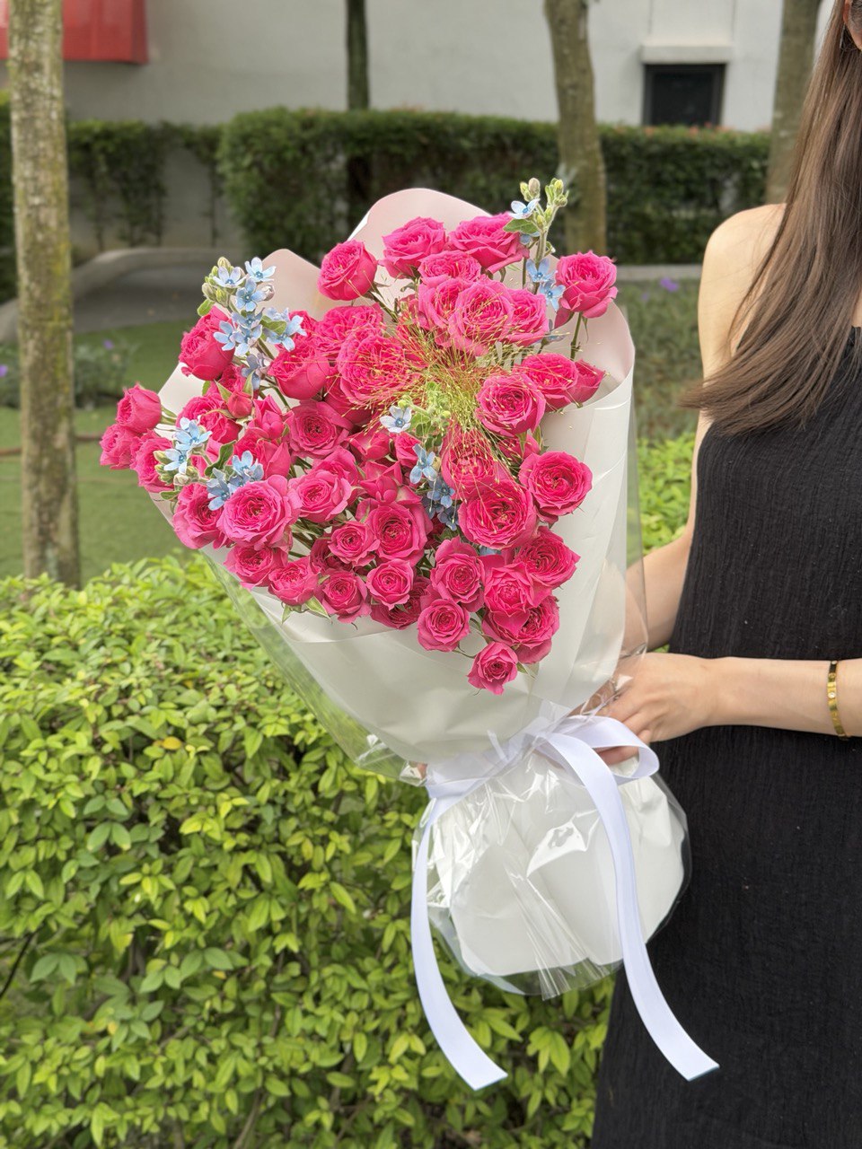 Romantic sophie rose spray bouquet with clustered pink roses in white wrapping, perfect for birthday and celebration flower delivery in KL Malaysia.