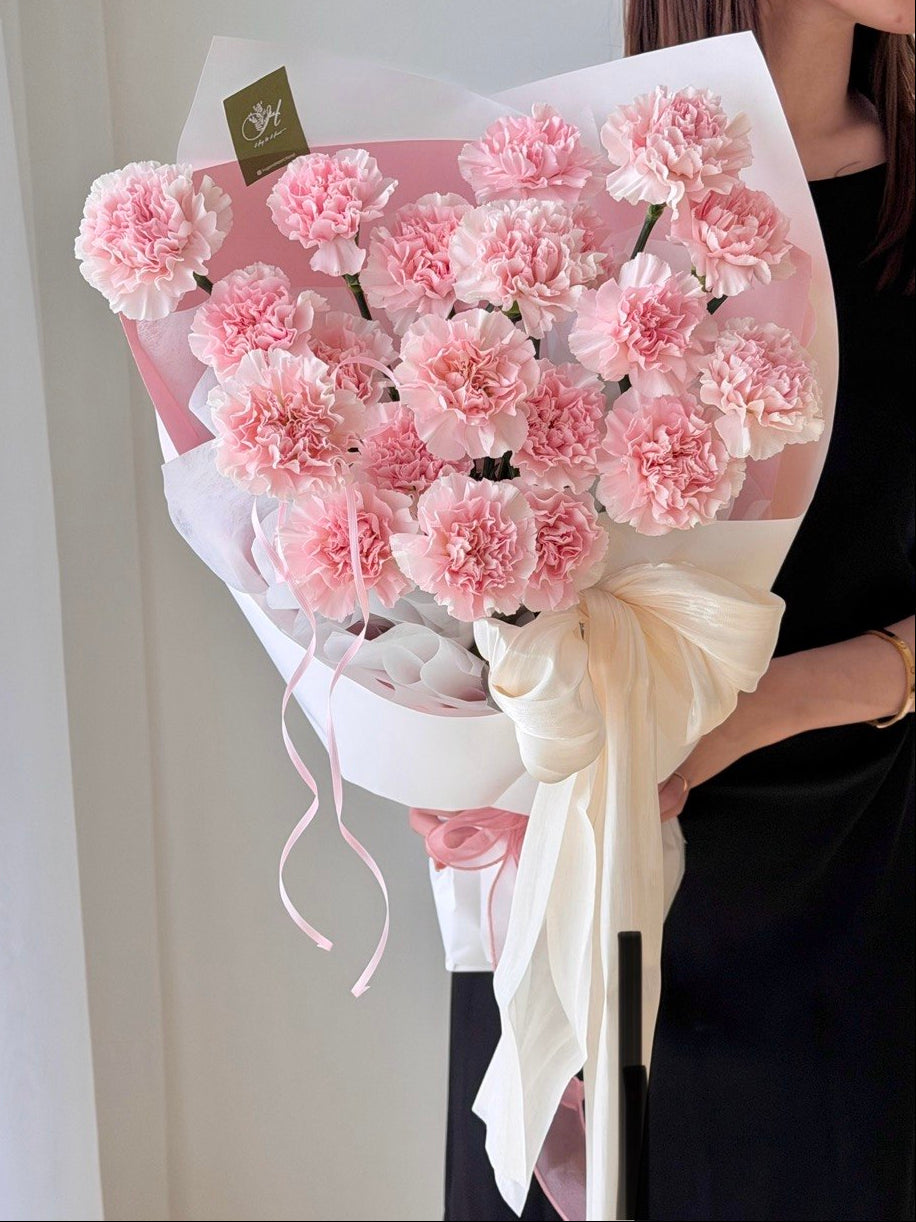 Mother’s Day pink carnation bouquet with fresh flowers and elegant wrapping with ribbon with delivery on KL and Selangor.