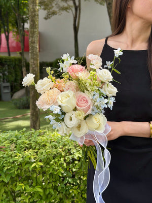 Minimalist ROM bridal hand bouquet with pastel roses and white flowers, civil wedding flower arrangement by KL florist Malaysia.