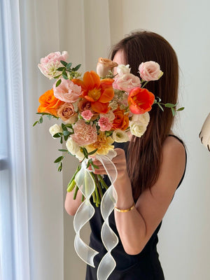 Luxury orange tulip hand bouquet with roses, carnations and lisianthus, perfect bridal bouquet with same day flower delivery KL.