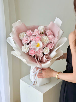 Premium soap flower bouquet for Mother’s Day with roses and orchid by Hug and Heart Florist.