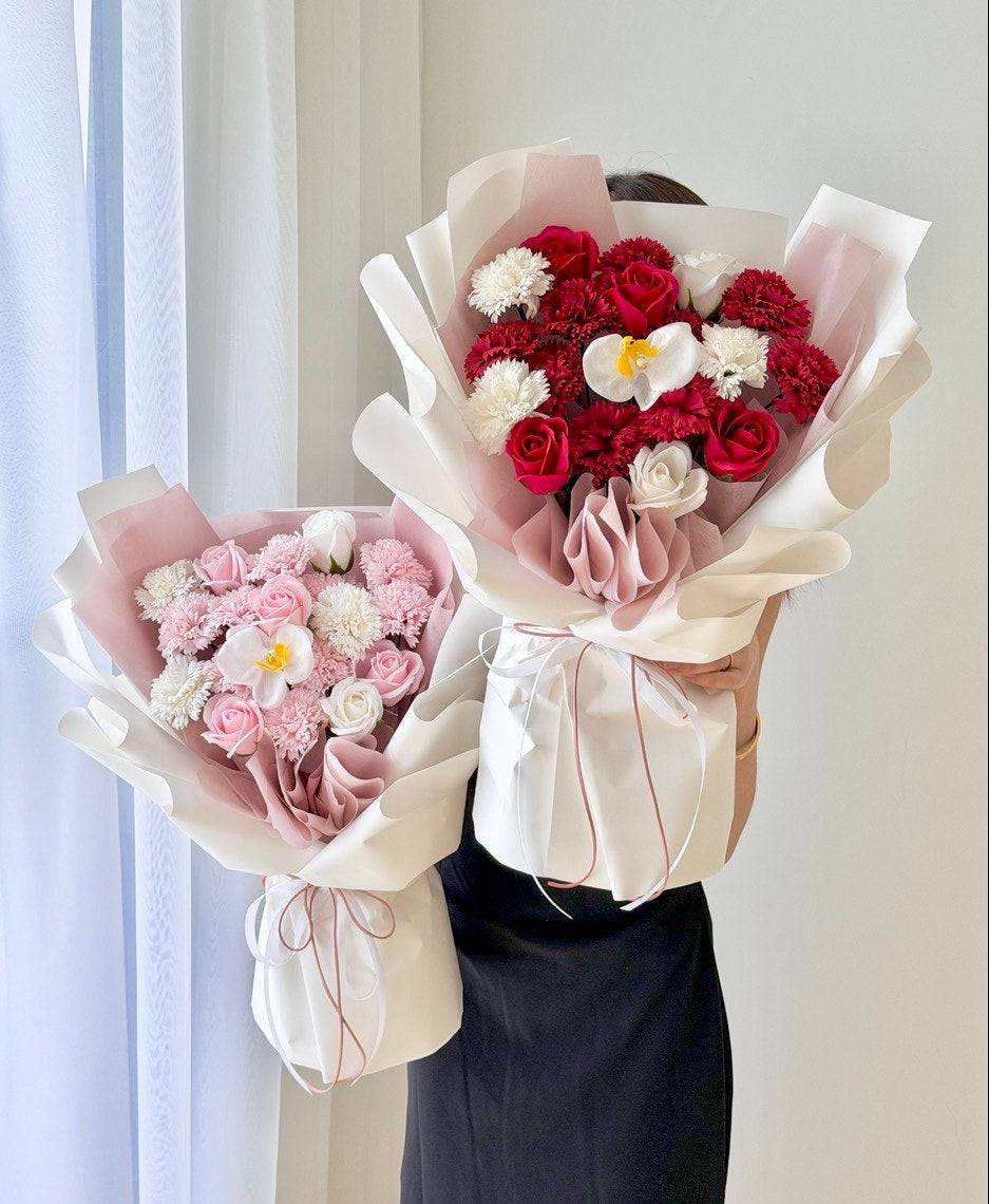 Mother’s Day soap flower bouquet with pink carnation, white carnation, red carnation, white roses and red roses by Hug and Heart Florist.