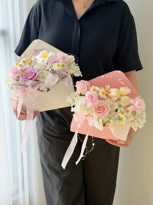 Elegant soap flower letter bouquet with pink roses, purple rose, white tulips, and daisy flowers for birthdays, anniversaries, and special occasions.