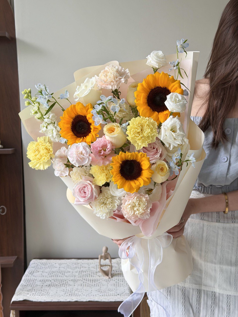 A graduation bouquet featured sunflower, pink rose, yellow carnation and mixed fillers perfect for Kuala Lumpur graduate.