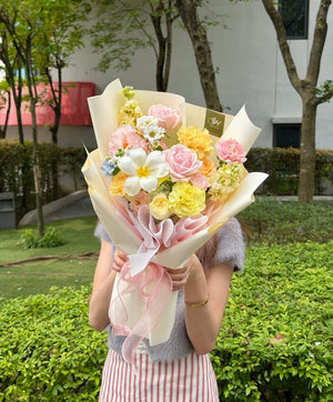 Hand-tied pastel flower bouquet perfect for birthday and anniversary gifts.