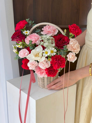 Fresh flower basket with red and pink blooms, ideal get well soon gift with same day delivery Kuala Lumpur florist.