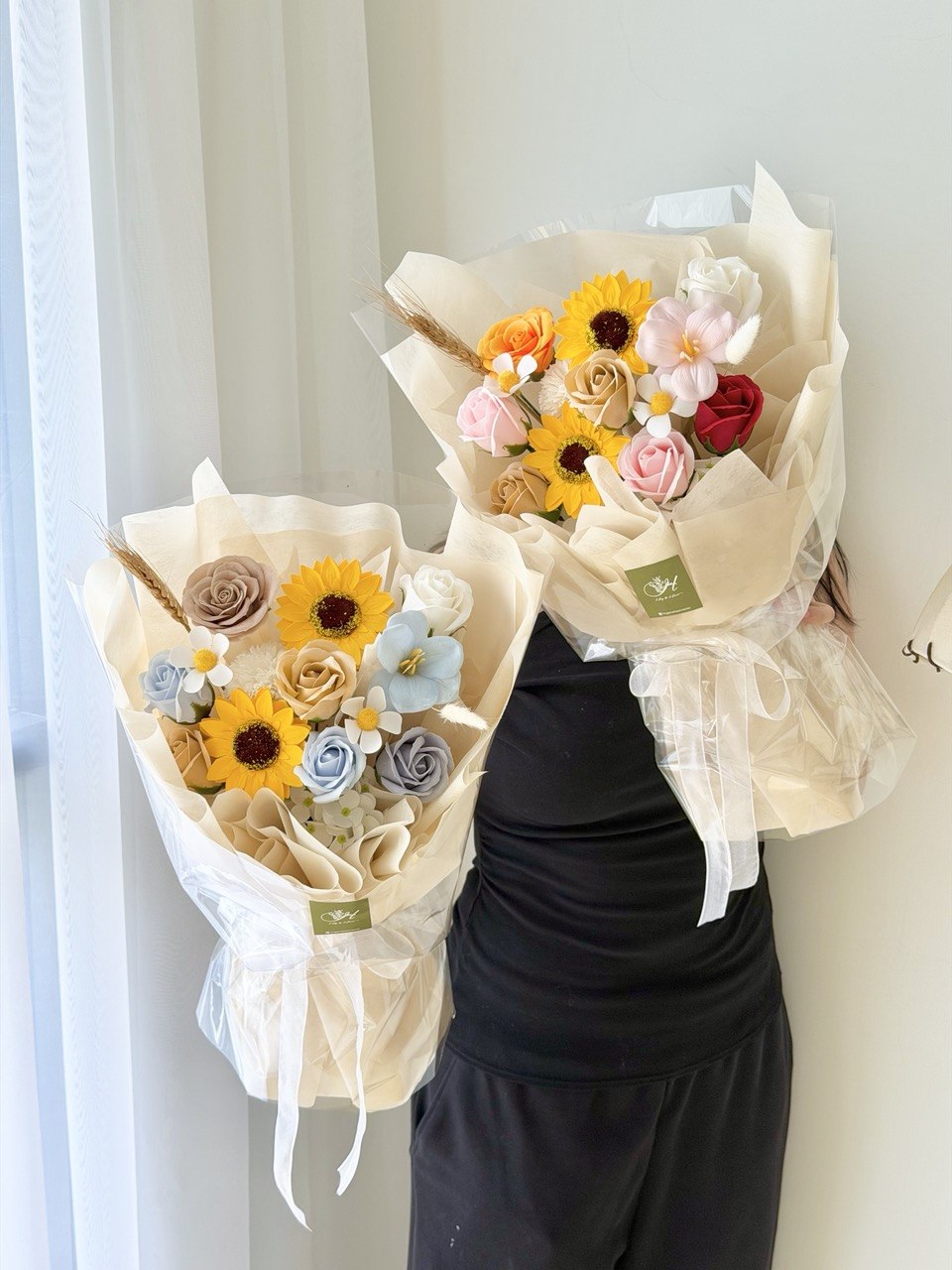 Sunflower themed soap flower bouquet with pastel roses, perfect graduation gift for college and university students.