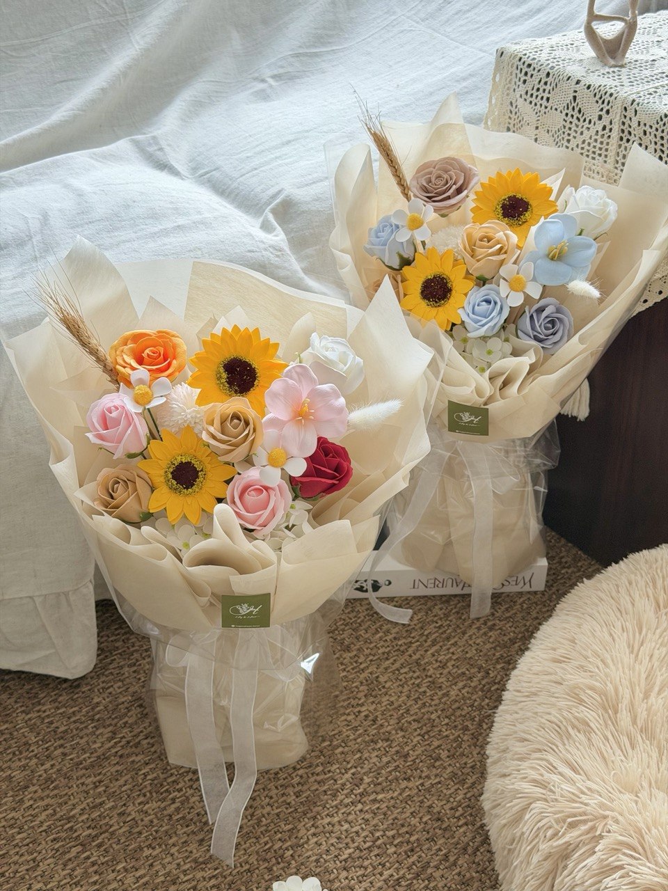Graduation soap flower bouquet with sunflower and pastel roses, perfect university graduation flower gift with same-day flower delivery.