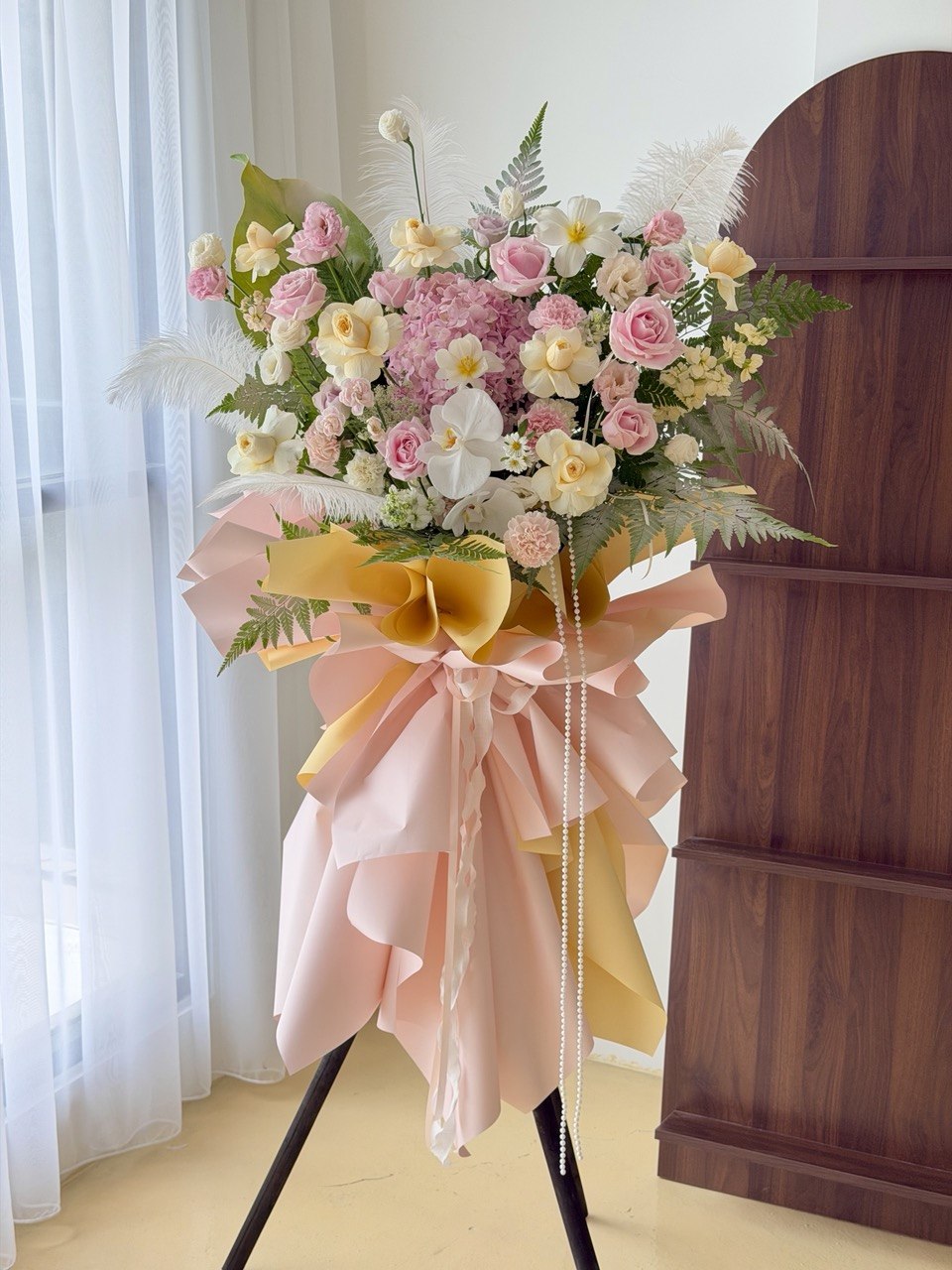 Premium business opening flower stand with fresh pink roses, white phalaenopsis orchids, cream roses and hydrangea, perfect for shop grand opening celebrations.