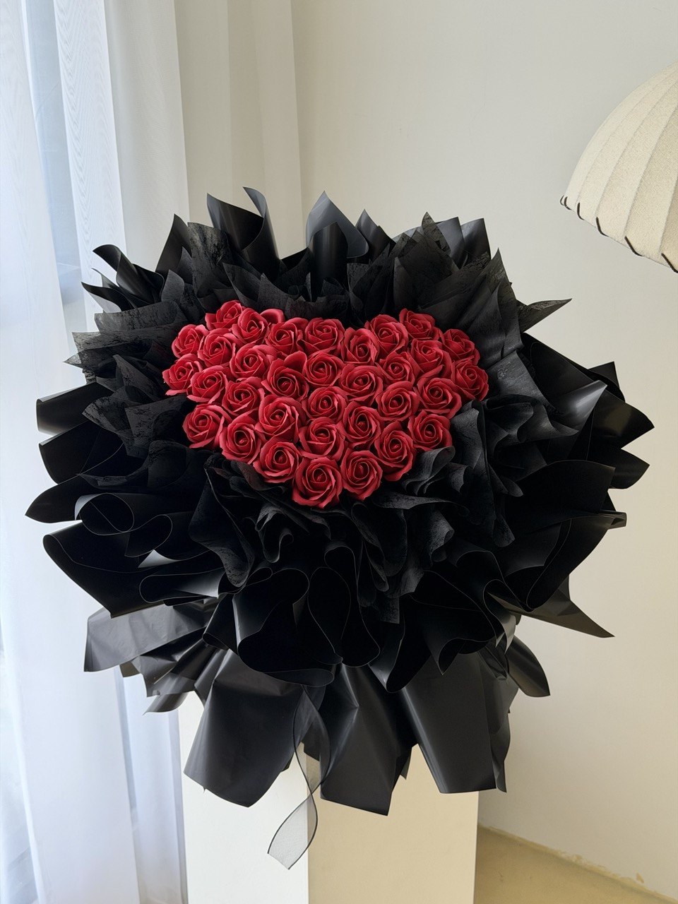 A bouquet of 33 roses wrapped in black wrapper perfect for proposal in Selangor and Kuala Lumpur.