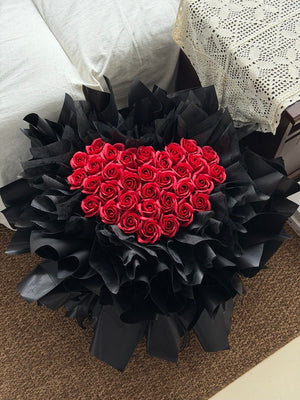 33 red rose proposal bouquet wrapped in black wrapper perfect for proposal in Kuala Lumpur and Selangor.