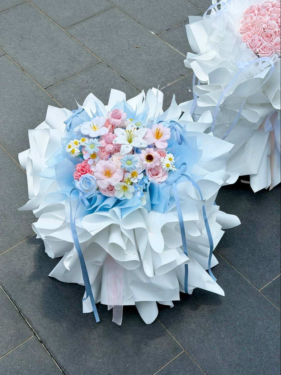 Ballet style soap flower bouquet with soft blue and white wrapping, elegant pastel floral arrangement for birthday, proposal or anniversaries flower.