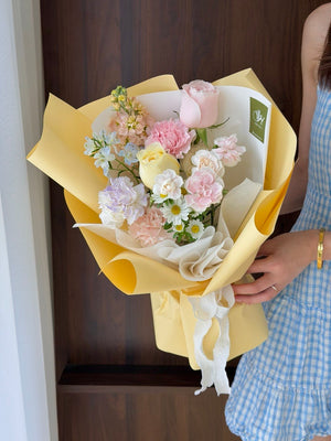 Cute small flower bouquet with mixed pastel blooms, perfect for first time meeting or thoughtful everyday gift.