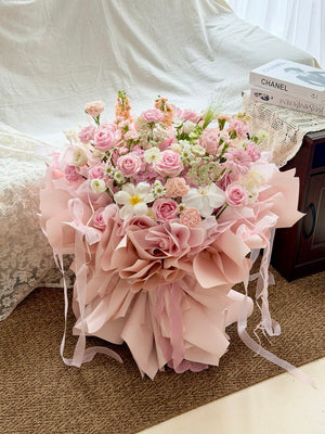 Soft pink luxury bouquet with hydrangeas, roses, carnations and delicate flowers.