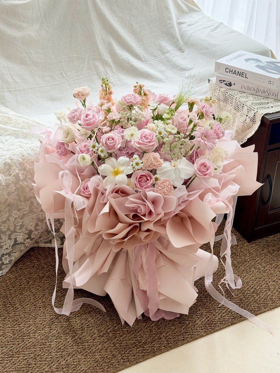 Soft pink luxury bouquet with hydrangeas, roses, carnations and delicate flowers.