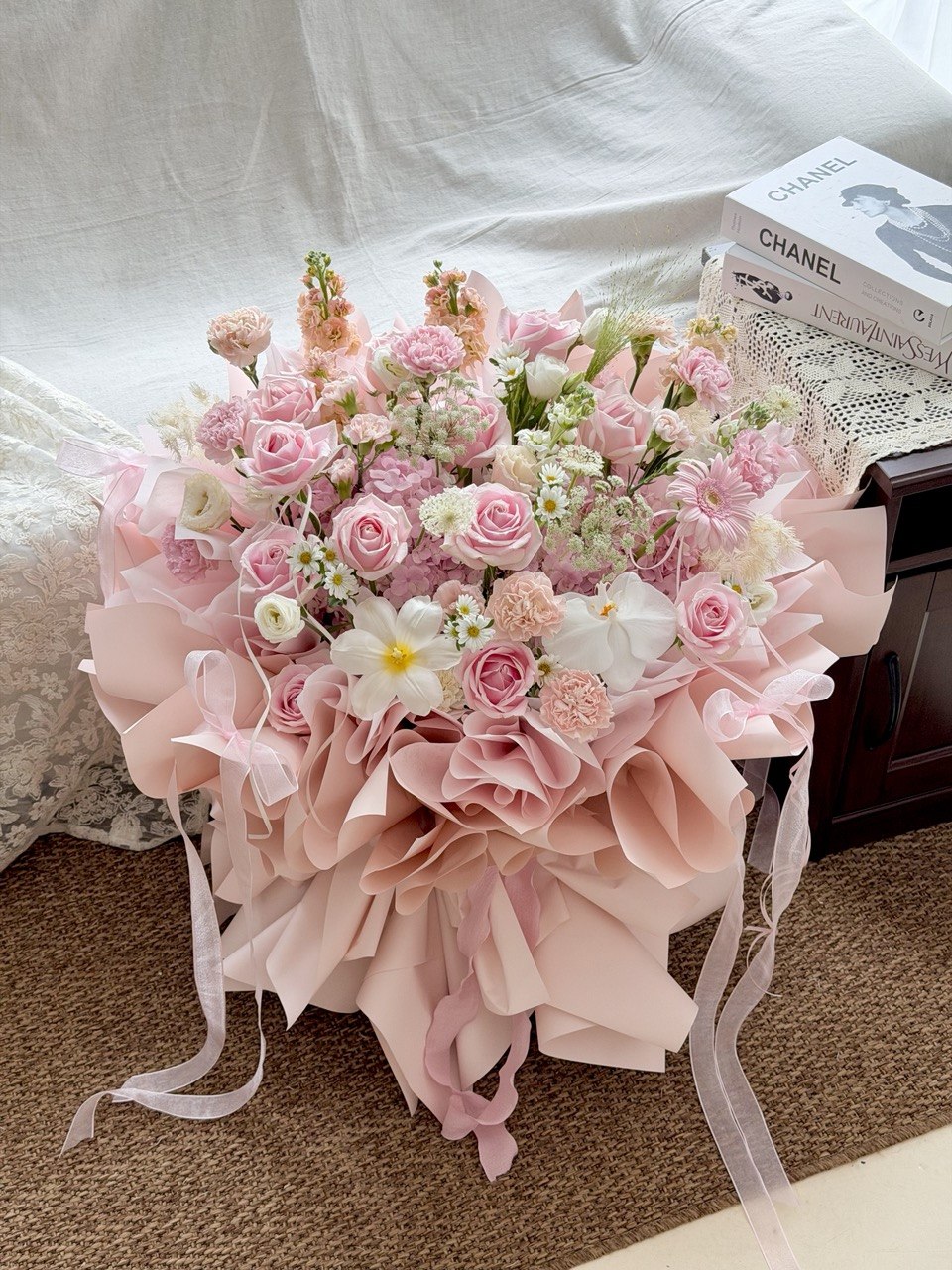 Pink hydrangea ballet bouquet with soft pink roses and delicate white flowers.