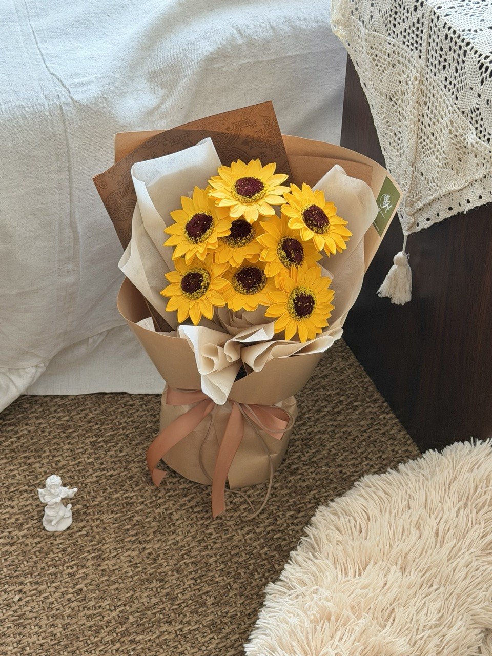 Bouquet of yellow soap sunflowers in a brown paper wrap perfect for sunway graduation.