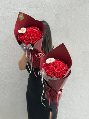 Handcrafted 20 red rose soap flower bouquet with peach tulip accent by Hug and Heart Florist, offering same day delivery across KL and Selangor.