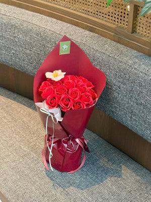 Luxury soap flower bouquet of 20 red roses and 1 peach tulip by Hug and Heart Florist, perfect for gifts with same day delivery in Kuala Lumpur and Selangor.