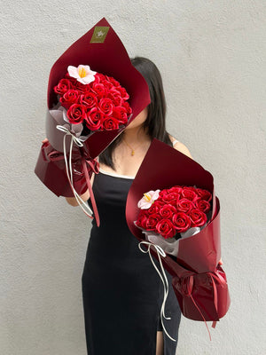 Elegant red rose soap flower bouquet featuring 20 red roses and a peach tulip, prepared by Hug and Heart Florist with same day delivery in KL and Selangor.